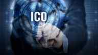 finger touching sphere with ICO written in white