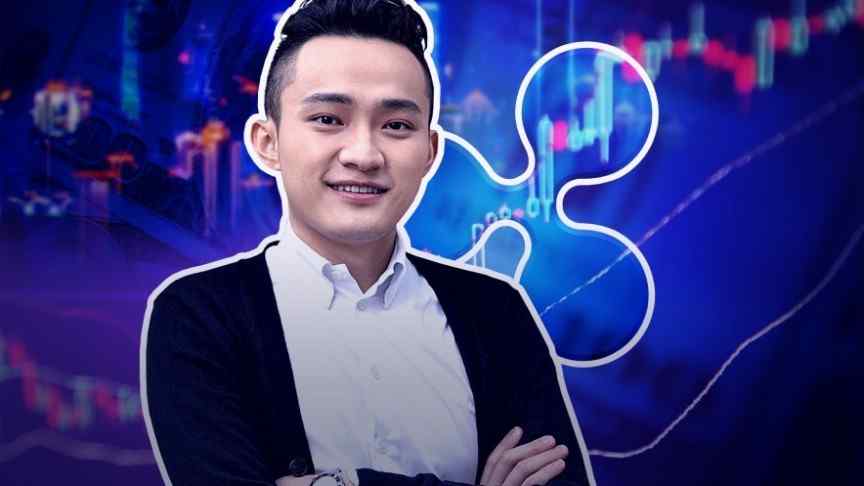 Justin Sun, hands crossed, on background of ripple logo