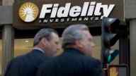 two man standing in front of fidelity building entrance