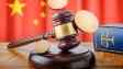 court gavel, bitcoins and book on wooden table, china's flag