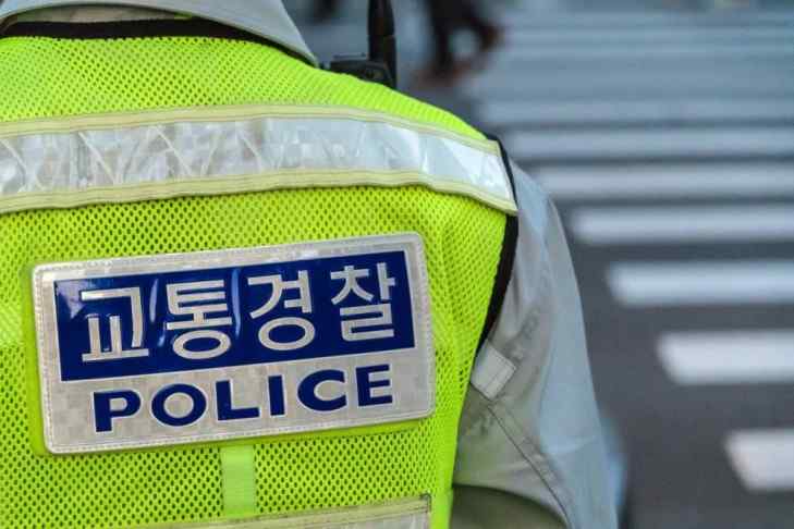 Close detail on South Korean police uniform