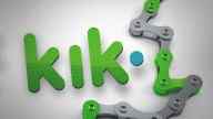 Kik logo next to a speed chain. Programming code slightly visible in the background.