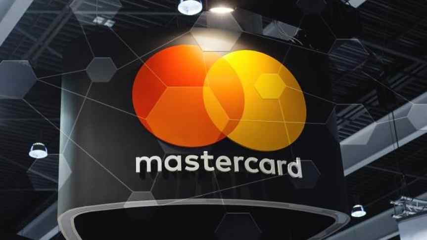 MasterCard logo overlaying a basic scheme for Blockchain