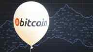 Bitcoin balloon on the background of market graph