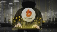 Bithumb logo on man wearing black cape with hood and no face typing on keyboard, floating numbers in yellow, buildings in background