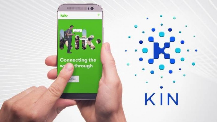 left hand finger pushes button on smartphone showing Kik's app home screen in green . White background, Kin token logo and name in blue on the right