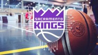 Sacramento Kings logo in grey, purple and white. Image of basketball on basketballcourt