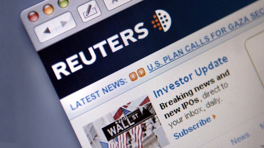 Reuters site showing name and logo and Wall Street news